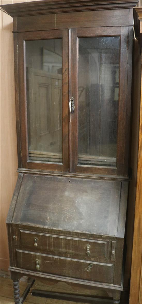 A 1920s oak bureau bookcase, H.207cm